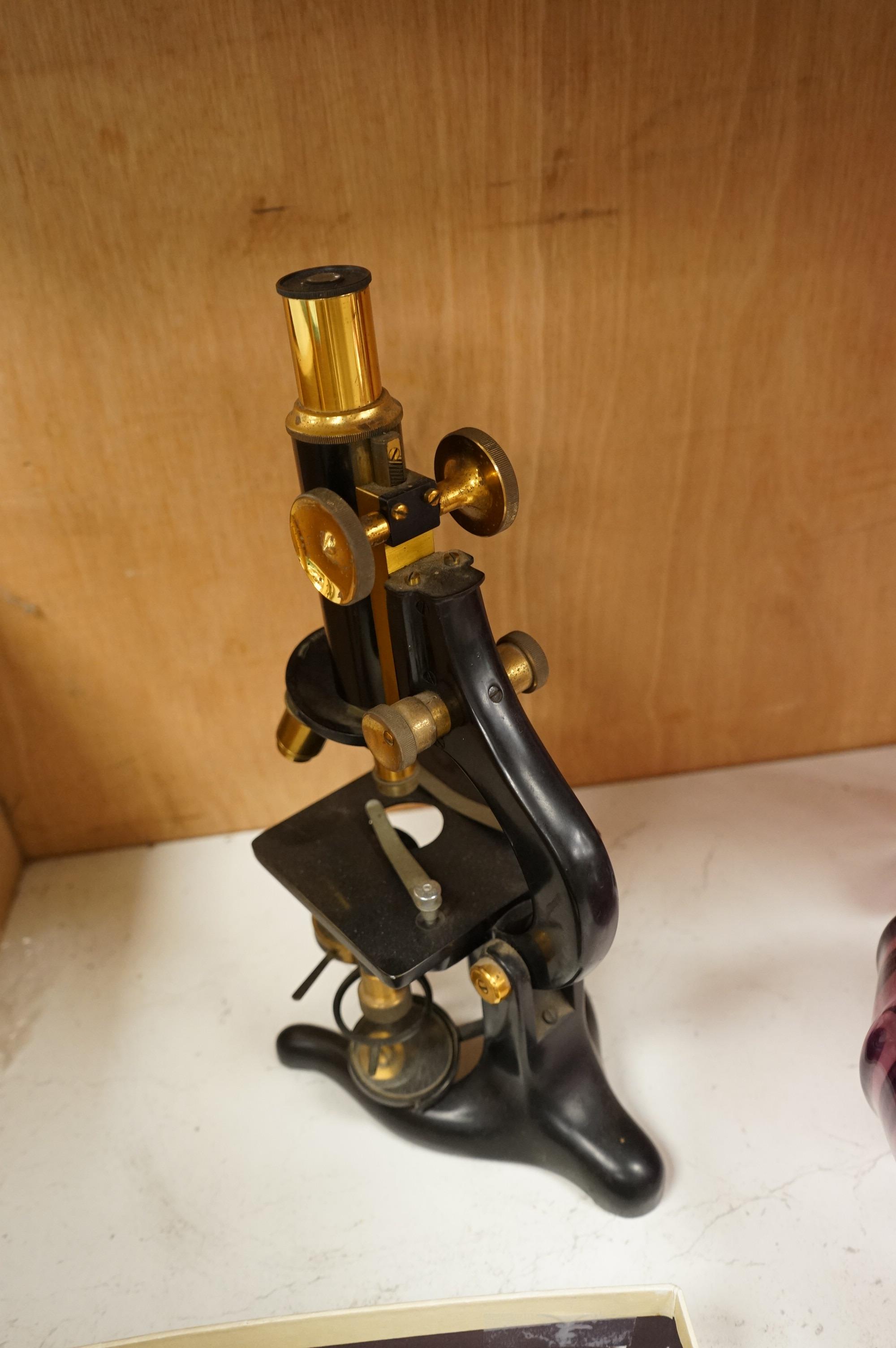 A parchment Indenture of Apprenticeship as a Surgeon and Apothecary between Nicholas Adams and Robert Seymour Adams of Hampshire, dated 1849, an early 20th century monocular brass microscope by W. Watson & Sons, 31cm hig
